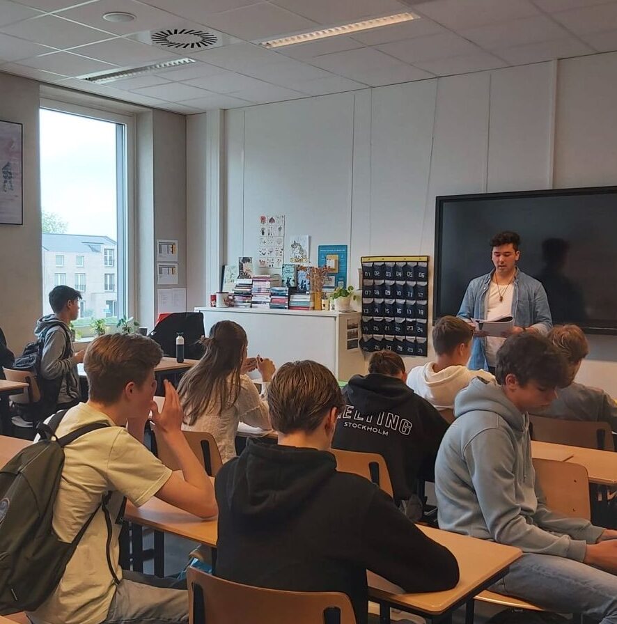 Joey Velberg in front of a class